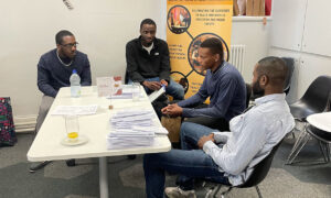 Dreamchasers meeting with students and teachers talking