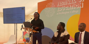 Johnoi speaking at the festival of education
